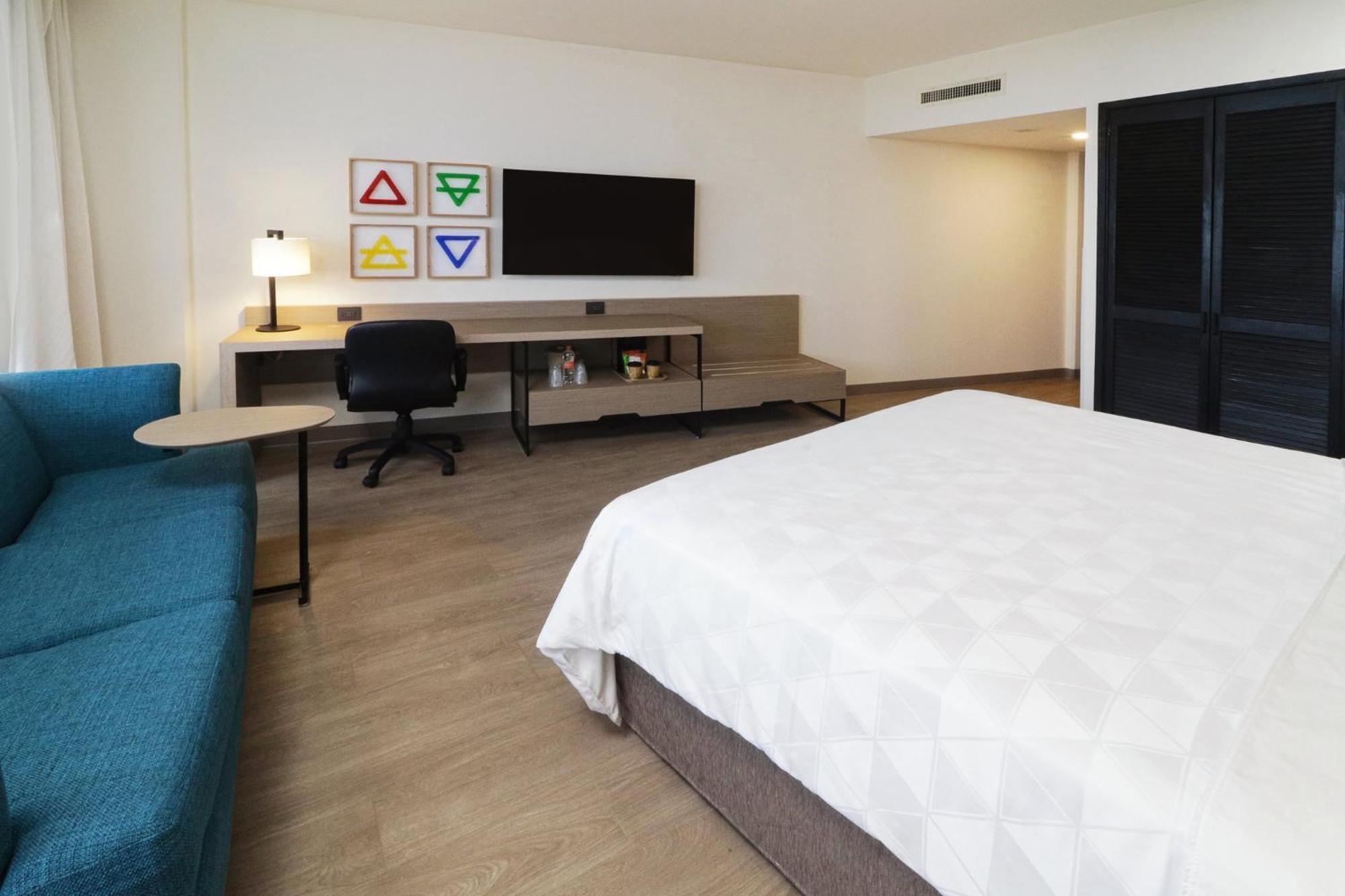 Holiday Inn Monterrey-Parque Fundidora By Ihg Exteriör bild A room at the Hilton Garden Inn